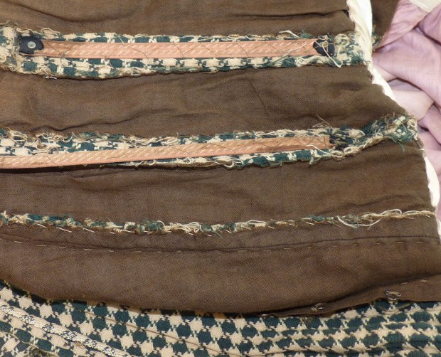 The lining is a coarse brown cotton.