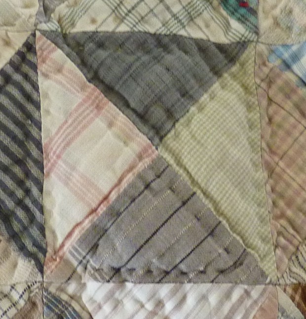 detail showing dark quilting threads