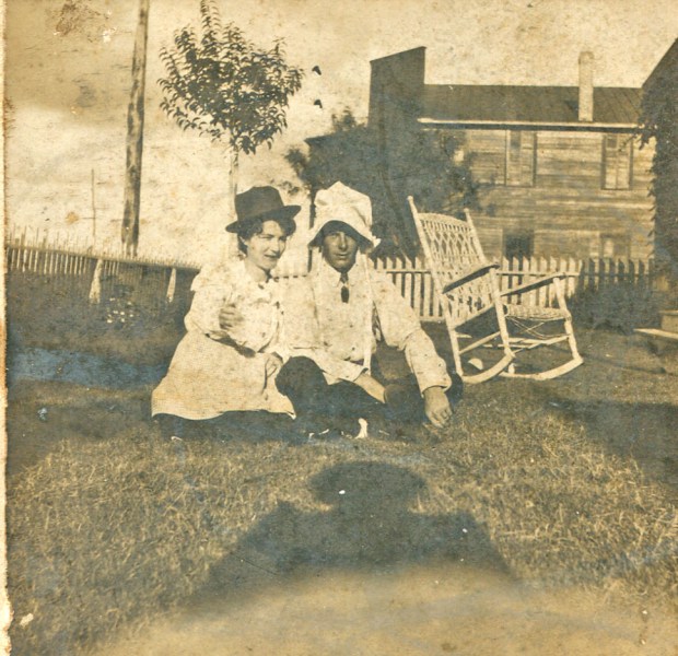 couple with switched hats