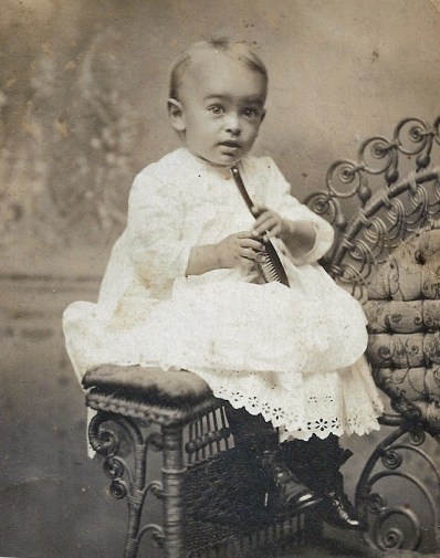 baby on rattan chair