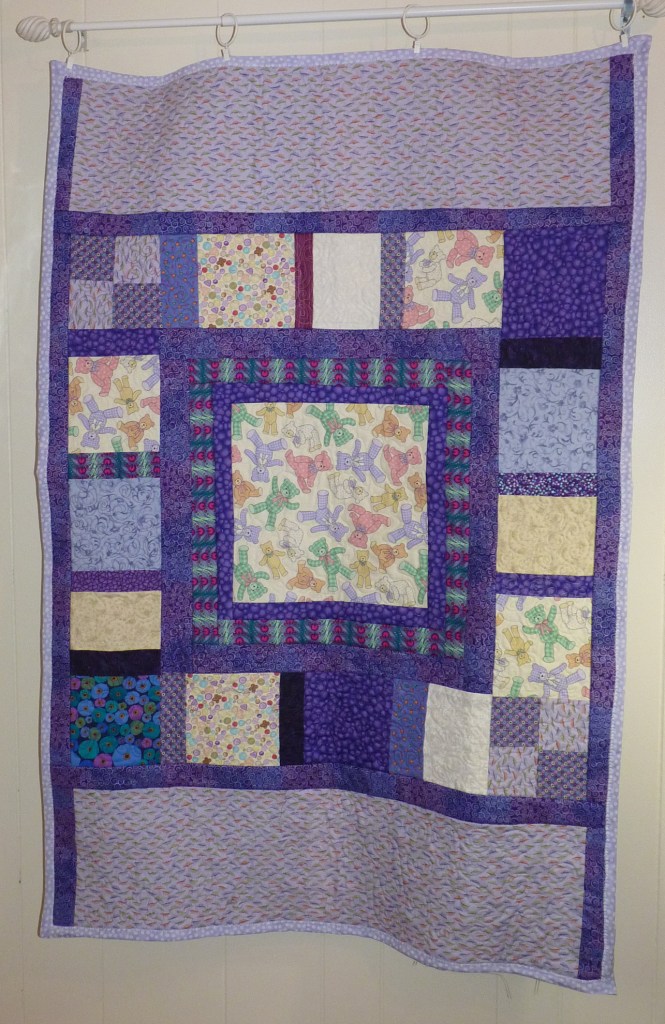 purple crib quilt