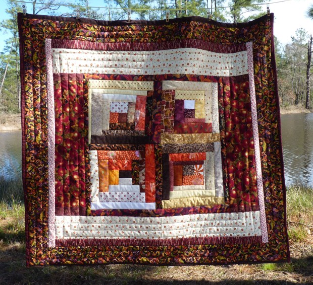 red and orange lap quilt