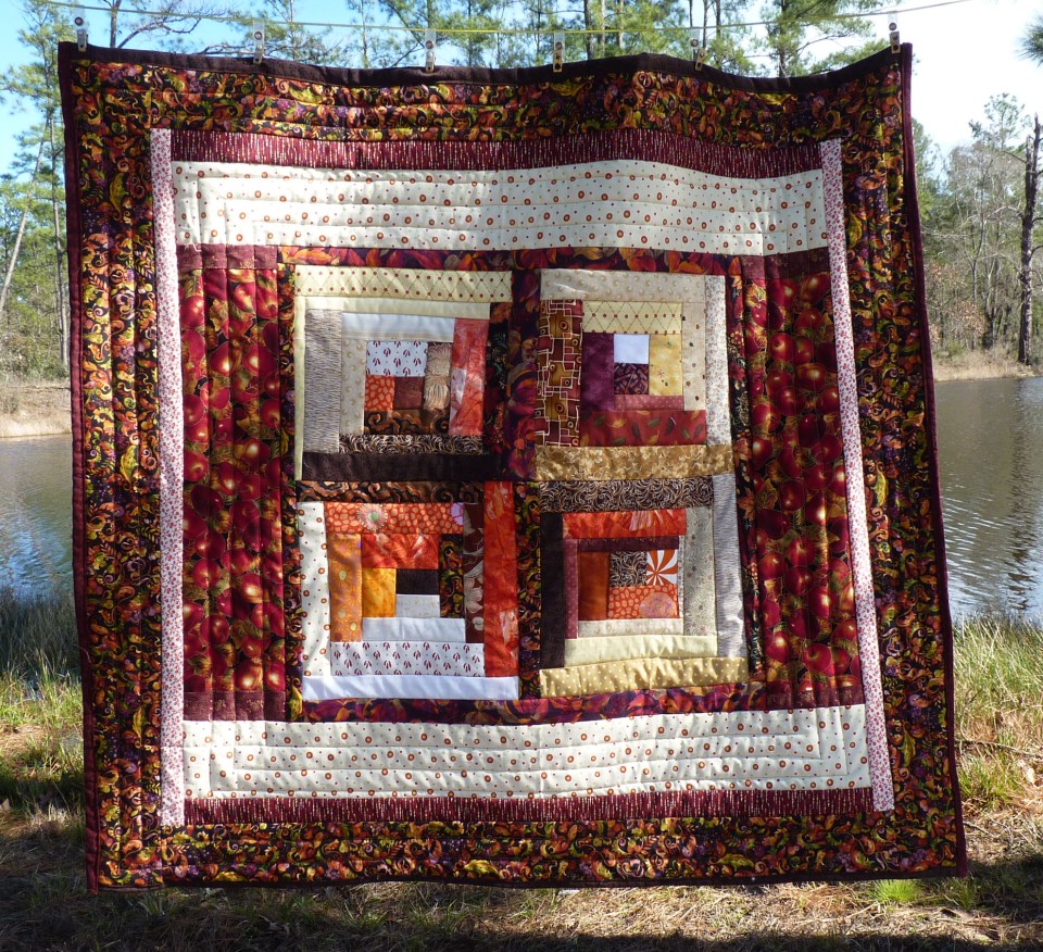 red and orange lap quilt