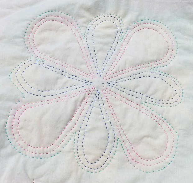 Block B reverse.  This petal pattern is probably the easiest to stitch, as far as not having to turn the hoop very often while covering the block with stitches.