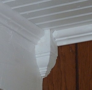 Cutting crown molding to make the corners meet properly is hard, at least with the equipment we had.  We opted for these corner blocks so the molding could be cut at a 90 degree angle.