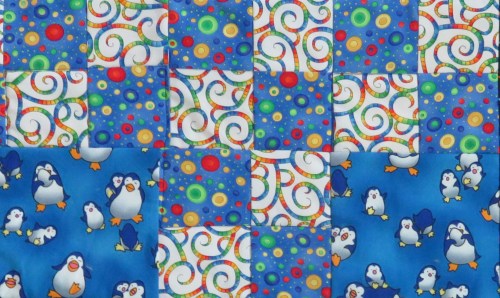 I love this penguin fabric, but its color palette is so limited, I had a hard time finding other prints that would blend with it.