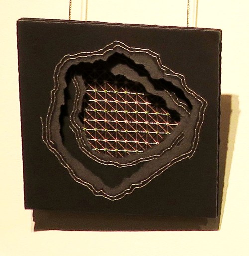 Untitled by April Hartley, 2014. Paper, cotton and metallic thread.