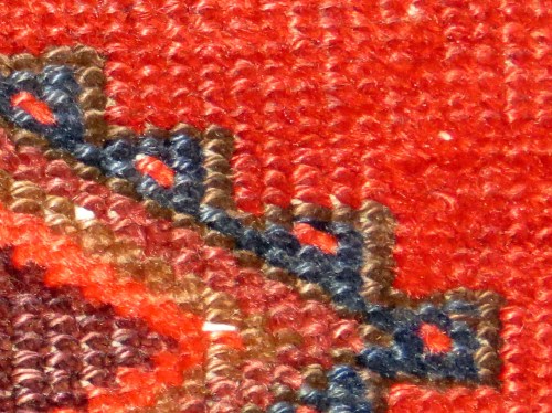 ..to the tiny dots of color that build up the design.