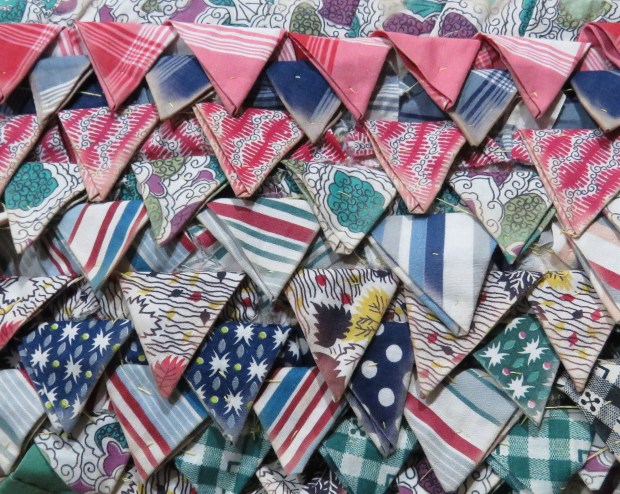 The same pieces, flipped down to show their original, bright colors.