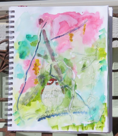 The tracing paper drawing is glued over acrylic paints, and any extra tracing paper is cut or torn away .