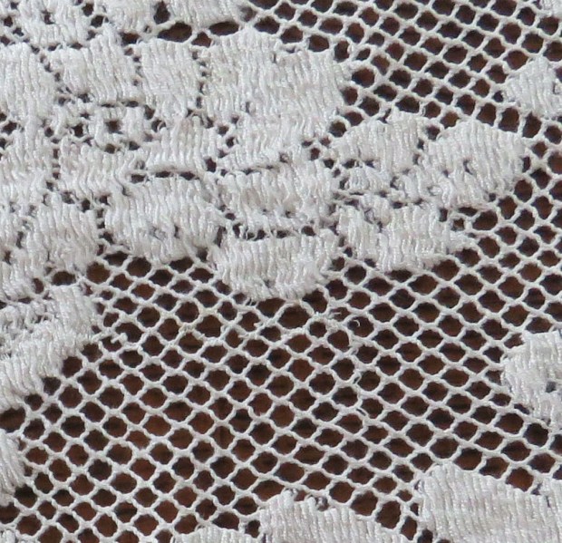 This Quaker Lace tablecloth shows still a different construction technique. This is machine-made lace.