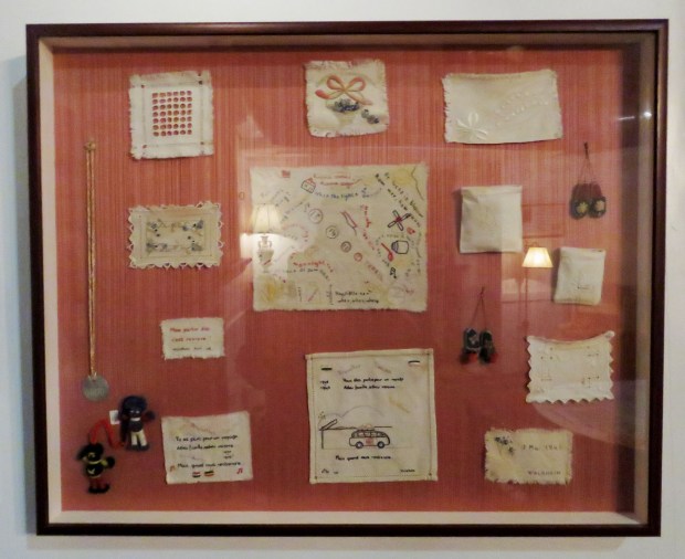 Embroideries done in secret by women prisoners in WWII, seen at the National Museum of the Mighty Eighth Air Force.
