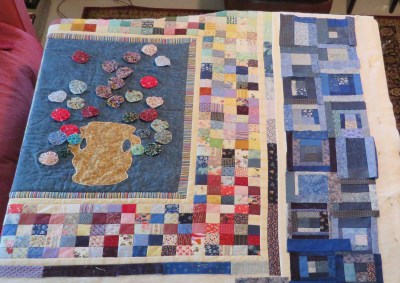Trying the blue log cabin squares with the center.