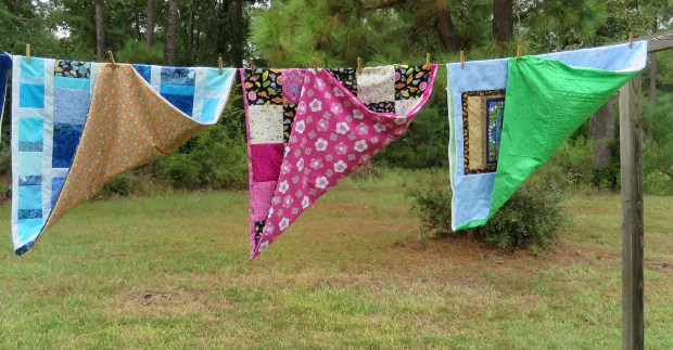 I did buy the bright pink fabric (but on sale!) but I had the other two backing fabrics on hand.