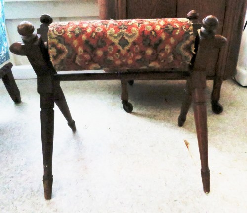 Is it a footstool? A shoe polisher? A rack for freshly ironed newspapers?