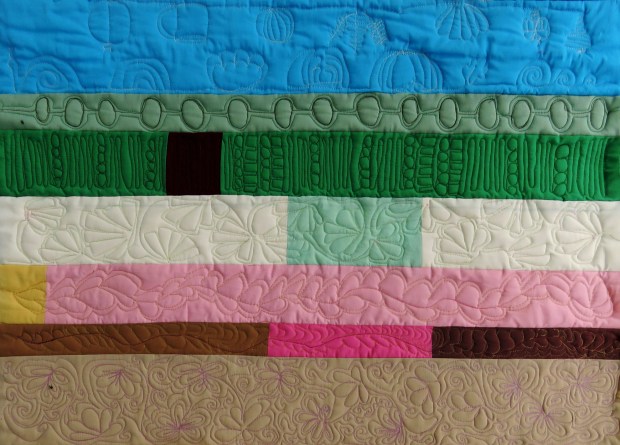 More rows of free-motion quilting practice.