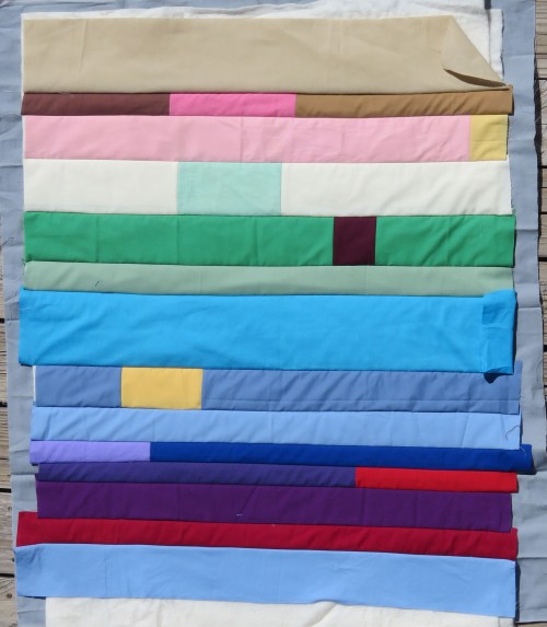 Perfectly decent strippy practice piece. My normal inclination is to leave well enough alone. But I need to practice free motion quilting on something!