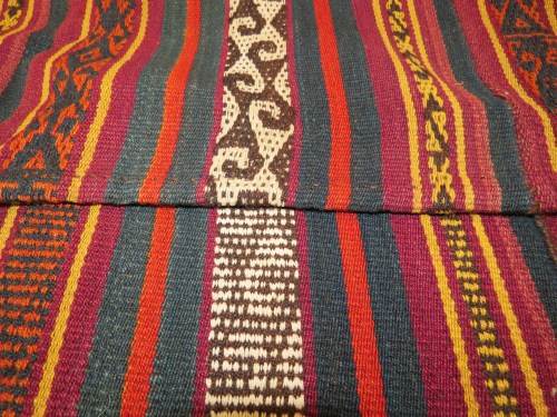 Front and back, showing how the warps float on the surface to make patterns.
