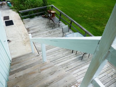 Old, sad, crumbling deck boards.