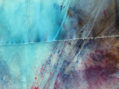 Unwashed on top, washed fabric on bottom.