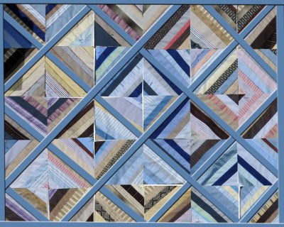 #4 - Diamond Sashing. Sashing in a midtone emphasizes the diamonds.