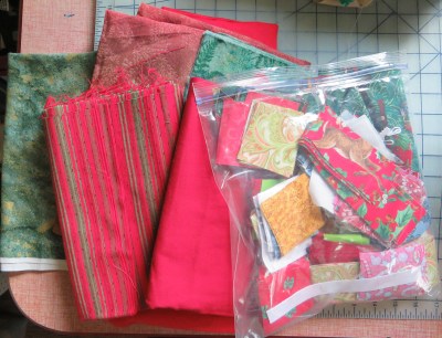 I don't usually do Christmas quilts but I can't pass up pre-cut pieces!