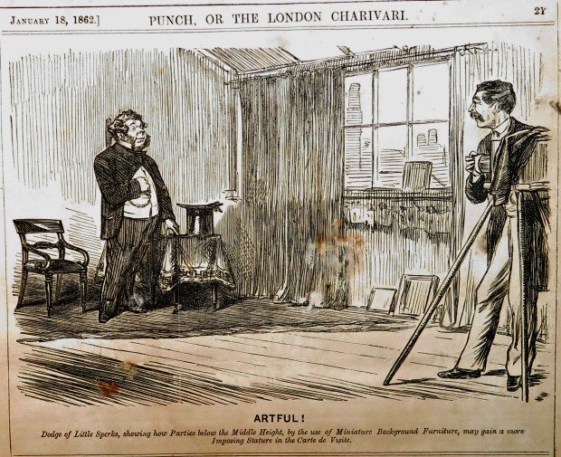"Artful!" Dodge of Little Sperks, showing how Parties below the Middle Height, by the use of Miniature Background Furniture, may gain a more Imposing Stature in the Carte de Visite.
