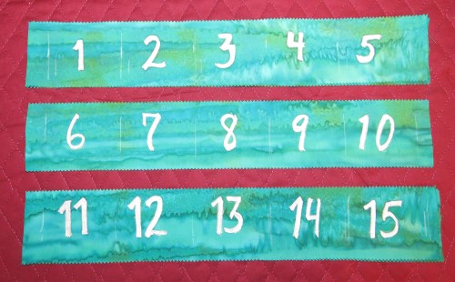 The number strips before being attached to the calendar.