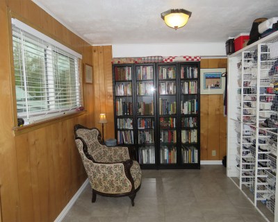 It may be odd to have bookshelves in a closet, but they fit nicely.