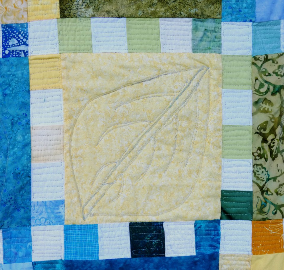 block with leaf outline