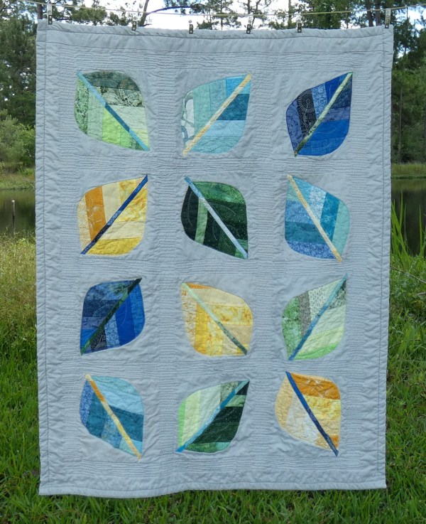 baby quilt with leaf shapes