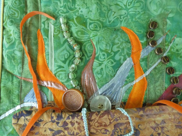 Stitched, painted, and beaded forms.