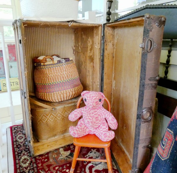 old trunk and teddy bear