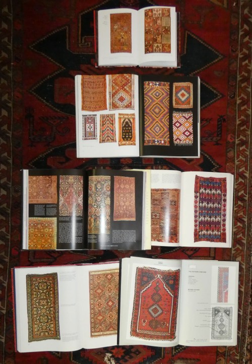 book pages showing oriental carpets
