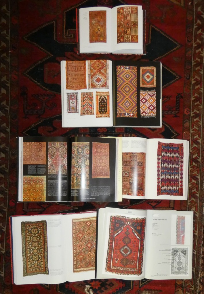 book pages showing oriental carpets
