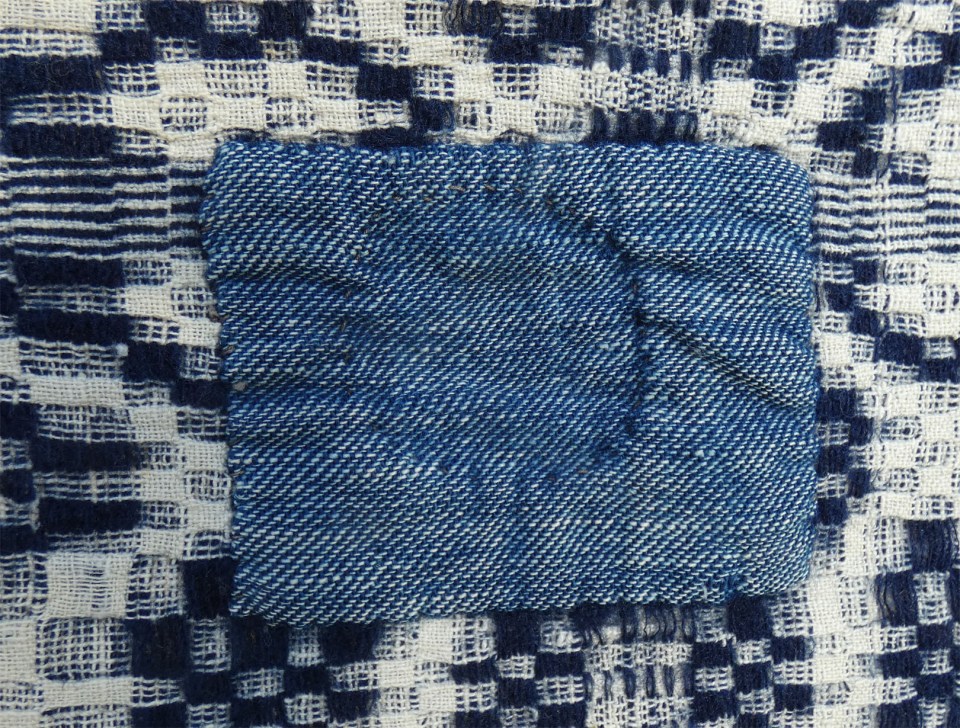handwoven patch on handwoven coverlet