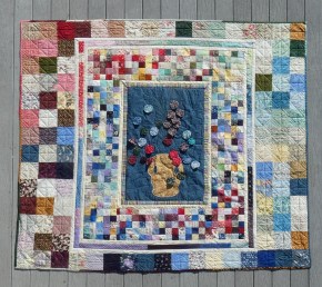quilt with yo-yos, small squares, large squares