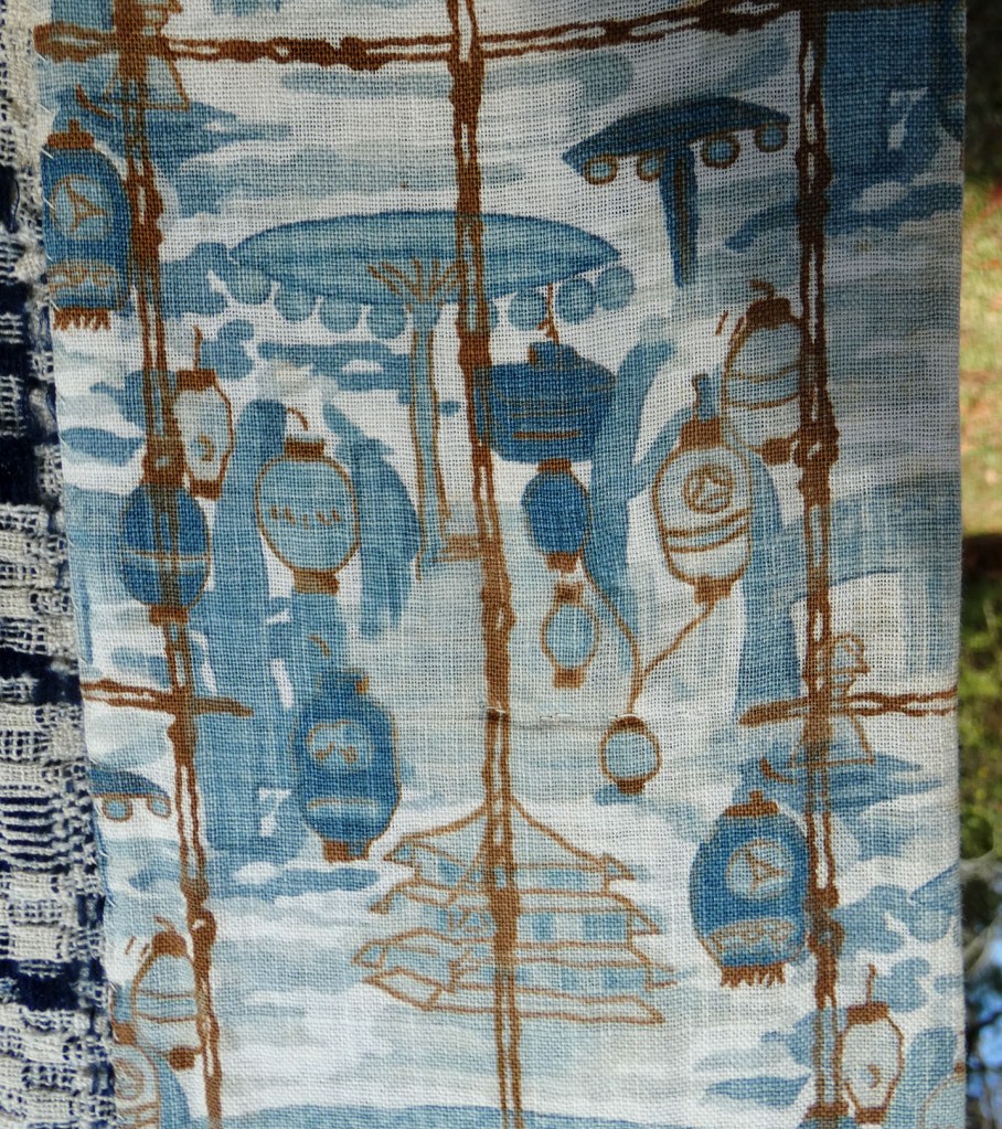 blue, gold, and white print cloth