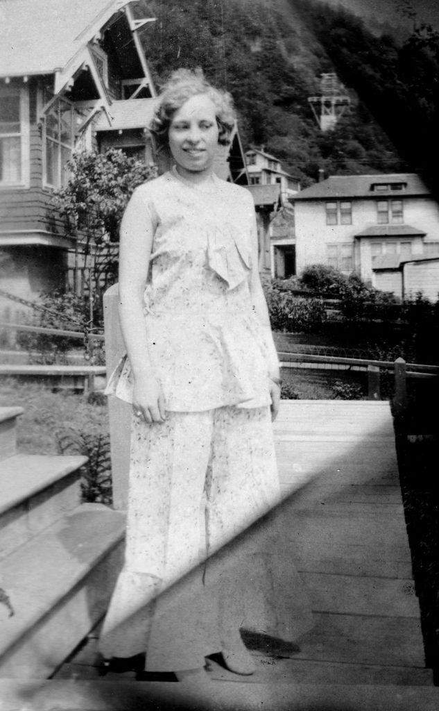woman in flouncy summer outfit, 1930s