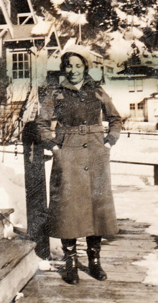 woman in belted coat and boots, Alaska, 1930s