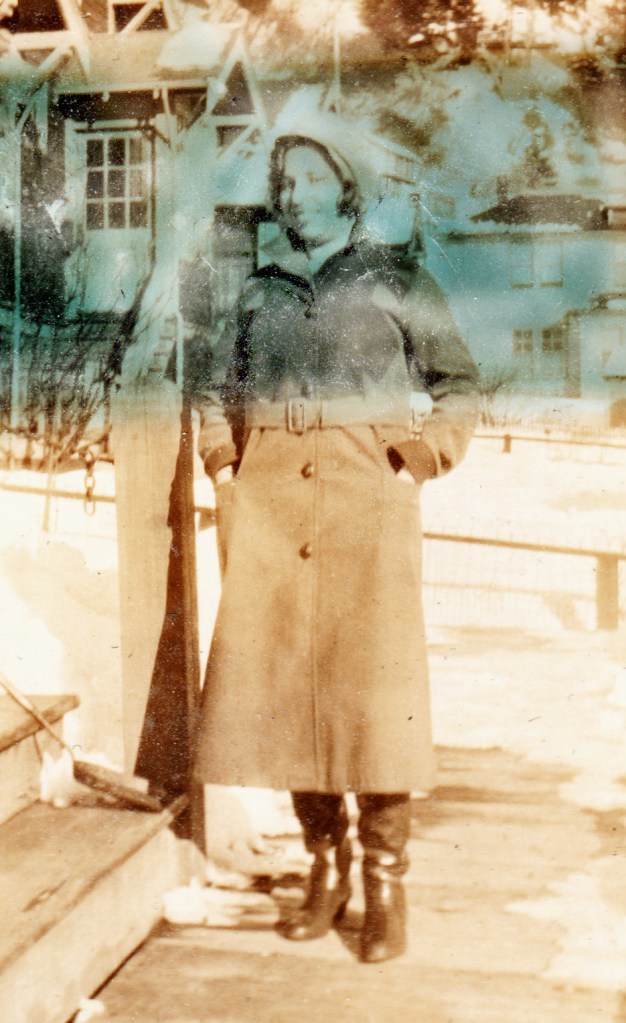 woman in long coat and boots, Alaska, 1930s