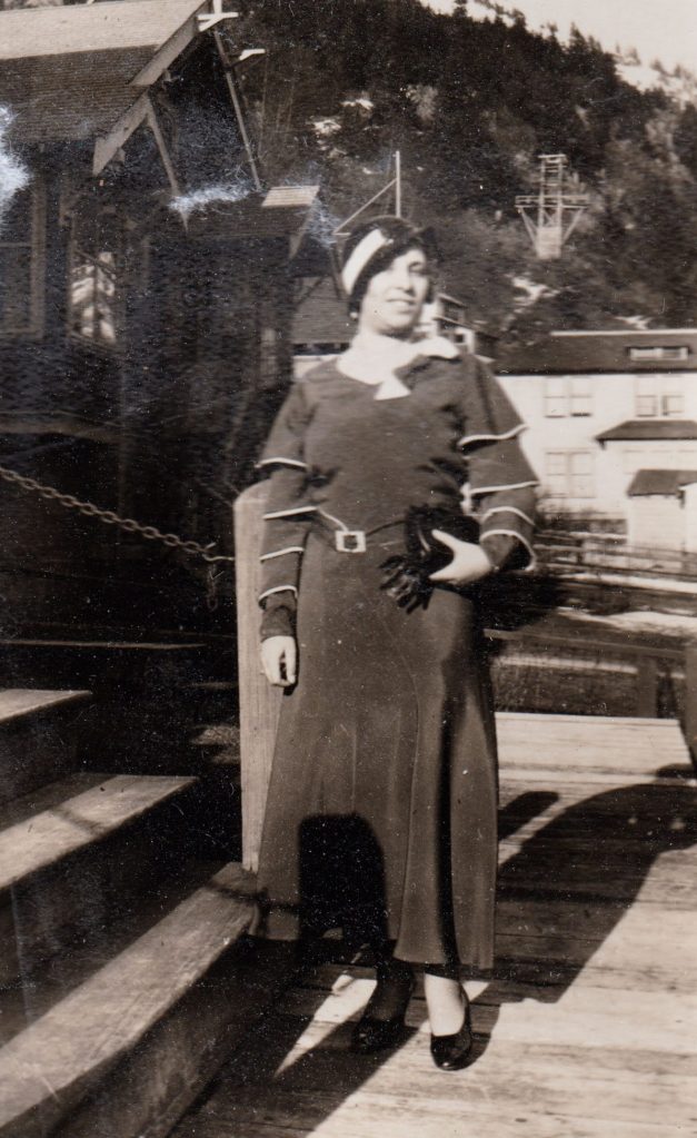 woman in dress with caped sleeves, Alaska, 1930s