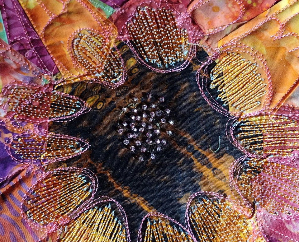 Detail of the beads and stitching.