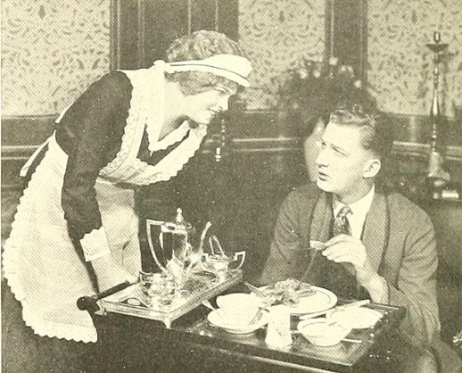maid serving breakfast on stage